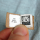 Image for article titled Pin-Sized Book Reminds Us of Life's Little Pleasures
